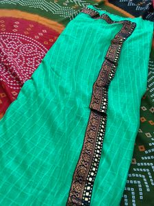 Elegant Green Saree with Intricate Border