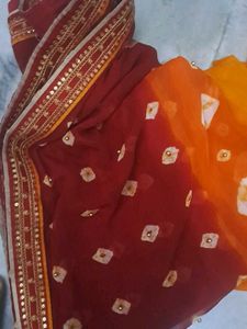 used Beautiful Maroon  orange Bandhani Saree