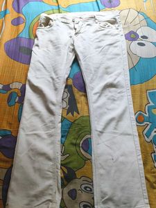 Cream Bell Bottom Jeans