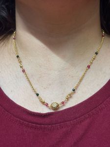 Elegant Gold Necklace with Gemstones