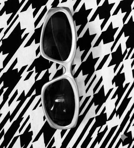 Chic Sunglasses with Houndstooth Accent