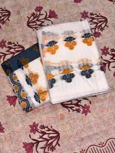 Elegant White Saree with Blue &amp; Yellow Motifs