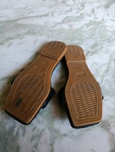 Black Flat Sandals with Oxidized Silver Embellishm