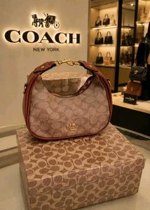 Coach Pink Signature Hobo Bag
