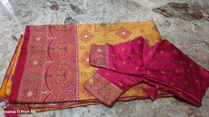 Vibrant Yellow Saree with Pink Blouse