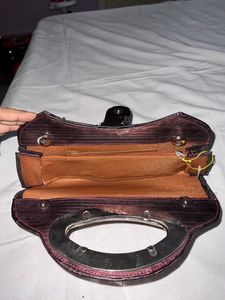 Wine Colour Silver Handle Clutch