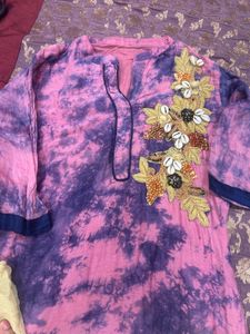 Vibrant Tie-Dye Kurti with Floral Embellishments