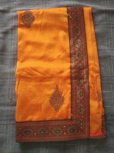 Elegant Orange Silk Saree with Embellishments