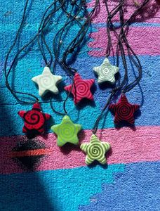 Hypnotic Swirl Star Necklaces