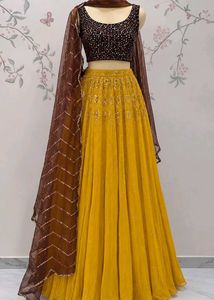 Stunning Yellow Lehenga Choli with Embellished Top