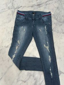 Distressed Denim Jeans.