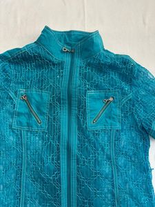 turquoise top with a zipper
