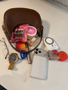 brown sling bag with belt