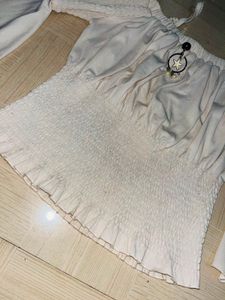 Off-Shoulder Smocked Cream Crop Top
