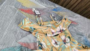 new with tag off shoulder frock
