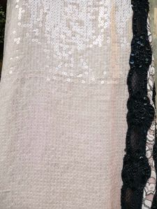 Halter neck sleek beige sequinned gown