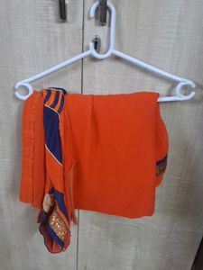 Vibrant Orange Saree with Blue Border