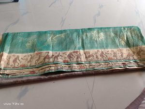 Beautiful Teal Saree with Golden Print