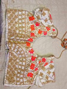 Vibrant Orange Saree with Embellished Border