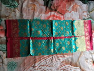 Elegant Turquoise Blue Floral Woven Saree with Mag