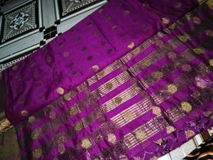 Vibrant Purple Saree with Gold Motifs