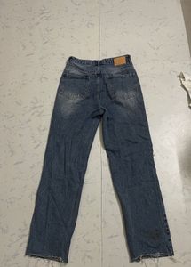 Distressed Blue Denim Jeans