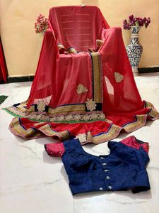 Elegant Red Embroidered pearl work Saree