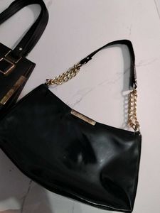 2 Chic Black Handbag with Gold Accents