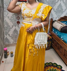 Stunning Yellow Ethnic Gown with Intricate White E