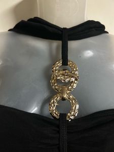 Chic Black Halter Neck Top with Gold Detail