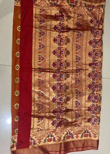Paithni Orange Saree with Embellished Blouse