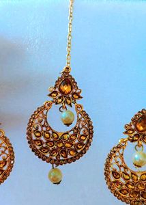 Elegant gold earing magtika set
