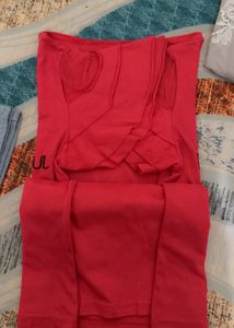 red tshirt eith some beeds