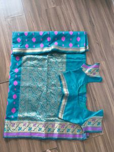Elegant Teal Silk Saree with Pink Motifs