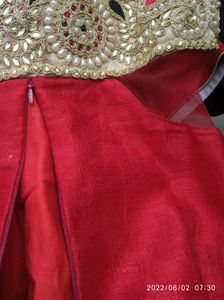 designer red and cream gown