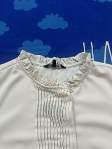 White Ruffle Blouse