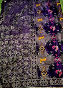 Elegant Purple Silk Saree with Intricate Gold Weav