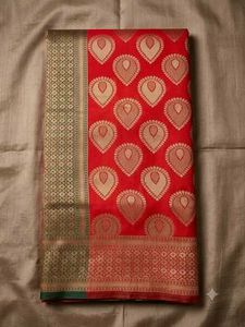Vibrant Red Silk Saree with Intricate Weave