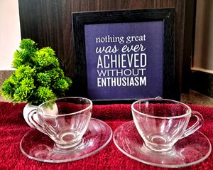 A Pair Of Transparent Cup & Saucers
