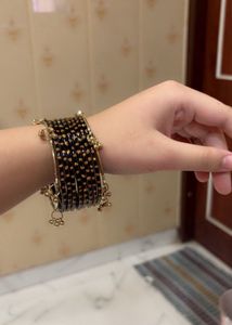 kashmiri Black Bangles set with Gold Charms