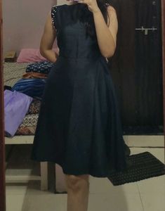 Elegant Black Dress with Pearl Accents