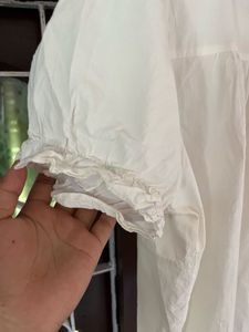 Cream Ruffled Button-Up Blouse