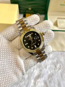 Rolex day and date watch ⌚