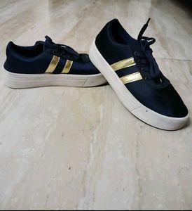 Stylish Navy & Gold Sneakers