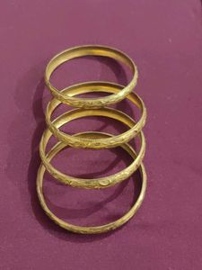 Set of 4 Gold Engraved Bangles