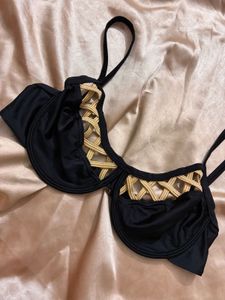 Stylish Black Bikini Top with Gold Detail