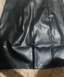 Black  Leather body hugging mini skirt