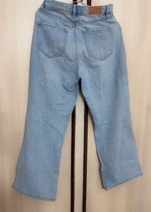 Ripped Light Wash Denim Jeans