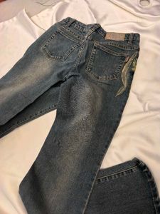 Unique Flared Jeans with Floral Design
