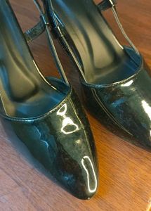 Black pointed heels with adjustable band